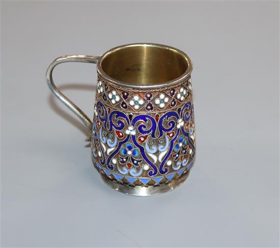 A late 19th century Russian 84 zolotnik gilt and cloisonne enamel small mug, assay master, RC?, 1888 height 44mm.